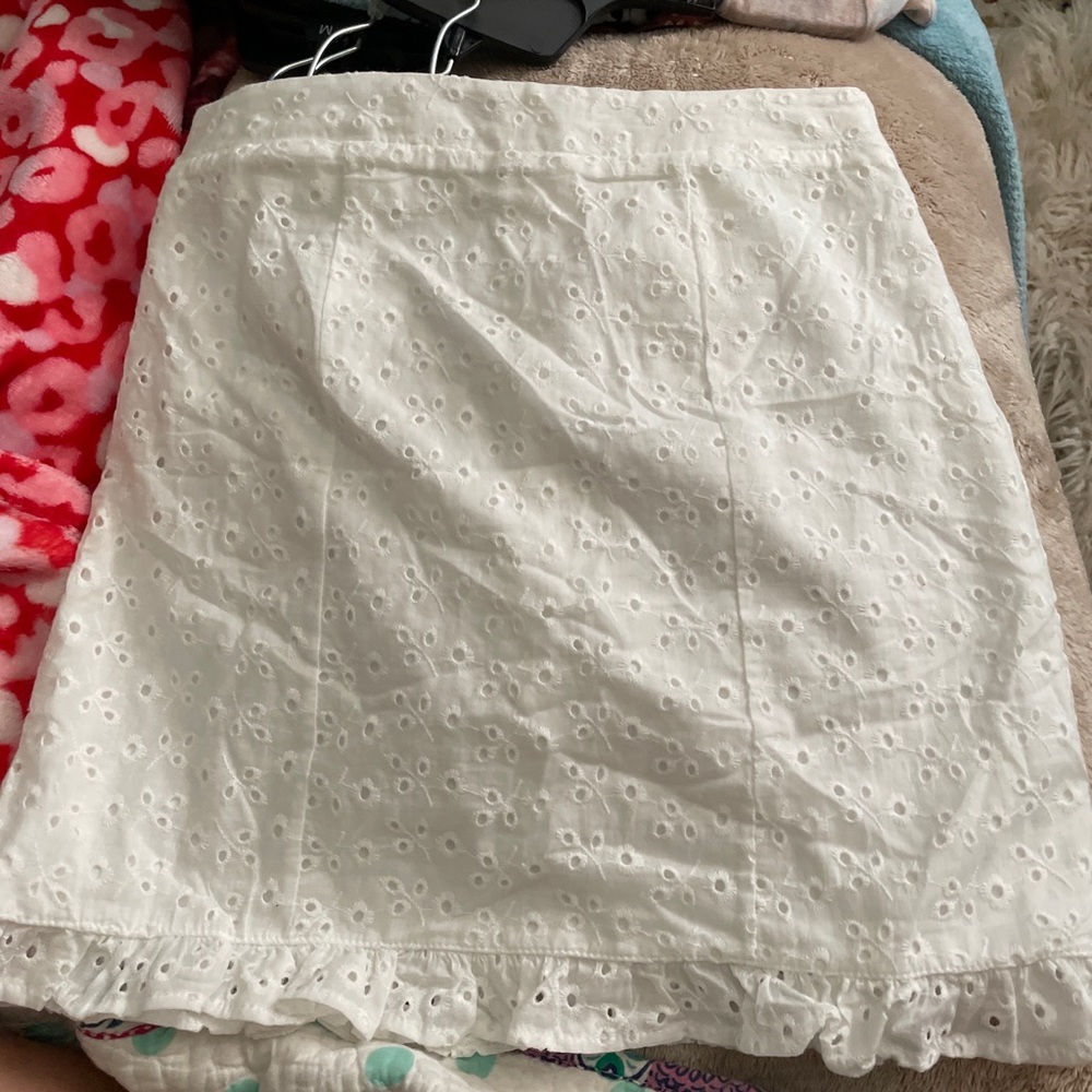 White floral design skirt with ruffles at bottom
